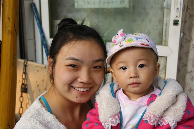 Famille dans les hutongs de Pékin - Chine